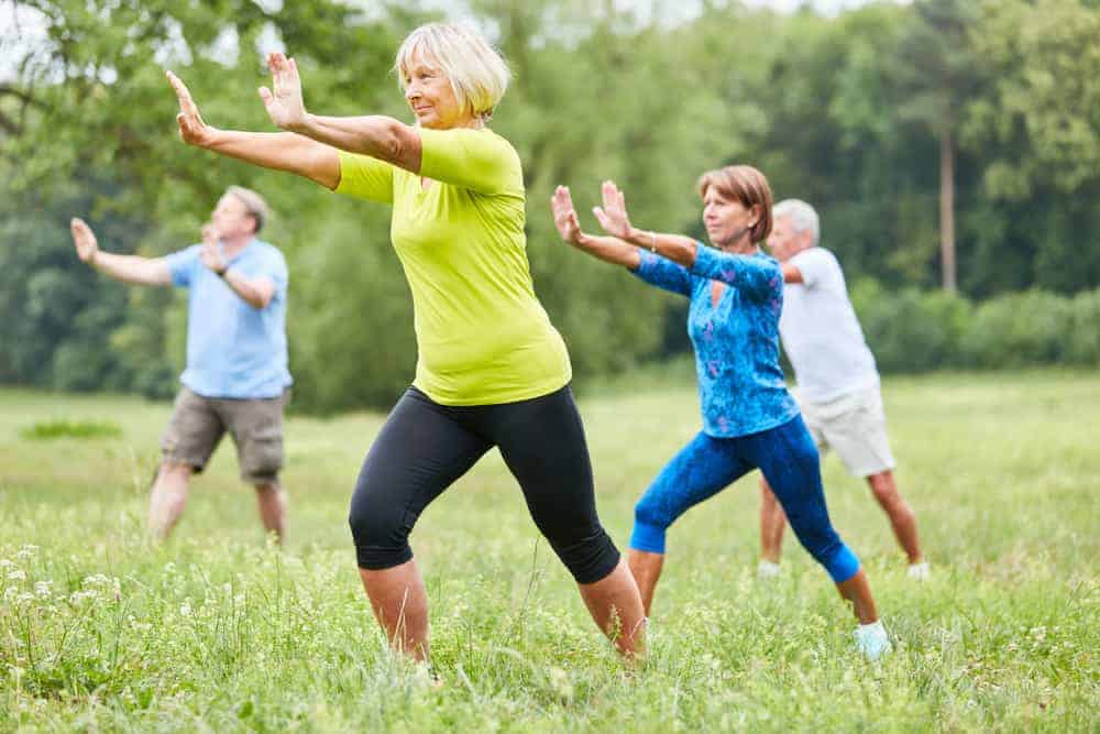 Seniors doing tai chi or qigong.